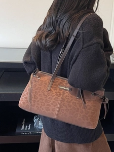 Retro leopard print tote bag in matte suede finish with slim shoulder straps and gold logo