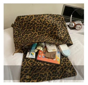 Leopard print tote bag interior showing large capacity for tablet and daily essentials
