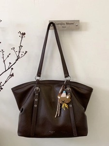 Minimalist large capacity dark brown leather tote bag with a cute bear pendant for women