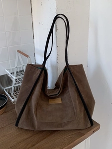 Brown faux suede tote bag with HOPEFUL patch and green plaid lining for daily use
