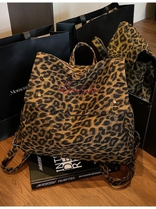Vintage leopard print canvas backpack with large capacity and stylish embroidery