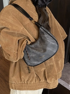 Retro grey half-moon hobo bag with wide shoulder strap and gold hardware accents