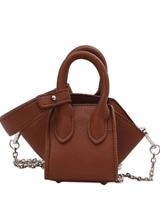 Mini caramel brown pebbled leather bucket bag with silver chain strap and metal feet