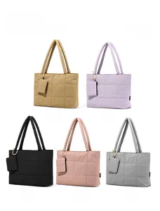 Quilted waterproof tote bags in khaki, purple, black, pink, and grey with mini pouches