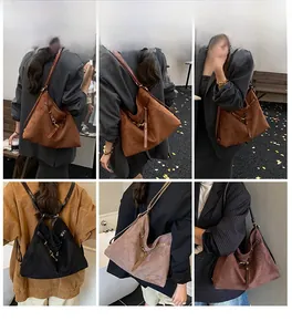 Dettaglio della borsa tote minimalista capiente in quattro colori che mostra la consistenza