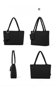 Multiple views of black quilted waterproof tote bag with matching square pouch
