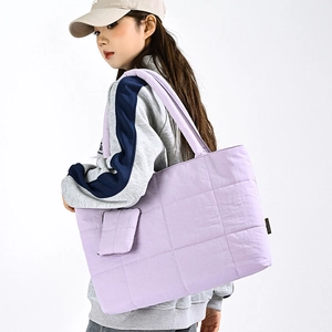Minimalist lavender quilted tote bag with matching mini pouch and wide shoulder strap