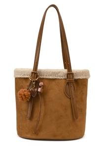 Fleece-trimmed brown faux suede tote bag with plush heart pendant on white background