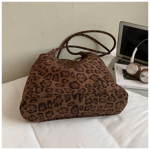 Detailed overhead view of the large leopard print tote bag with soft fabric texture