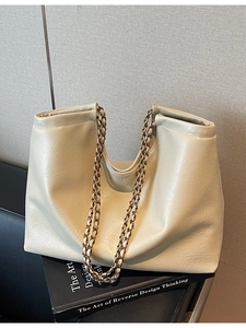 Retro cream chain tote bag with leather texture and golden metal straps for women