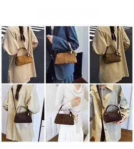 Detail showing high-quality suede pillow bag with leopard print and gold metal ring handle