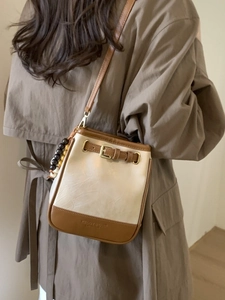 Minimalist patchwork crossbody phone bag in cream and brown with wooden bead charms
