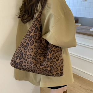 Close-up of leopard print tote bag with wide strap for comfortable shoulder carry