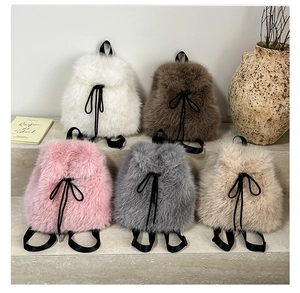 Detailed plush faux fur backpacks in five colors with drawstring ribbons for autumn