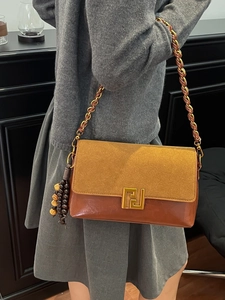 Retro colorblock leather crossbody chain bag with gold geometric clasp and wooden beads
