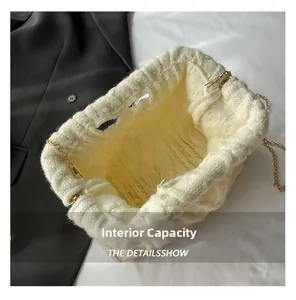 Close-up of the spacious interior and quilted knit texture of this macaron makeup bag