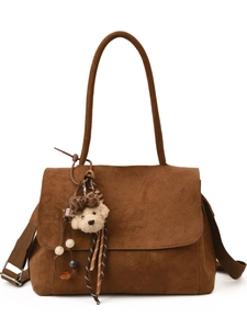 Retro brown suede handbag with crossbody canvas strap and decorative bear charm