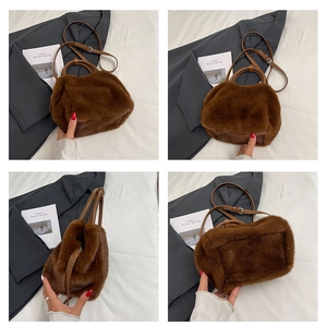 Detailed views of brown faux fur crossbody bag with leather handles and silver hardware