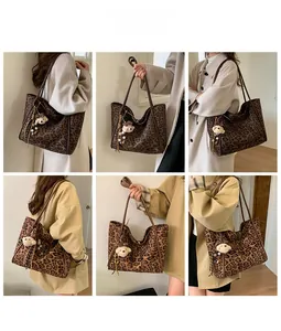 Detail shots of a large leopard print tote bag with a cute bear plush keychain accessory