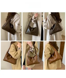 Detailed views of leather tote bag with metal buckle on models in winter coats