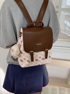 Sac à dos femme bicolore élégant avec imprimés chats et joli pendentif mouton