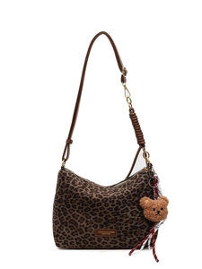 Fashionable leopard print tote bag with adjustable brown strap and plush bear pendant