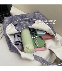 Detailed interior view of a starry print canvas tote bag showing its large storage capacity