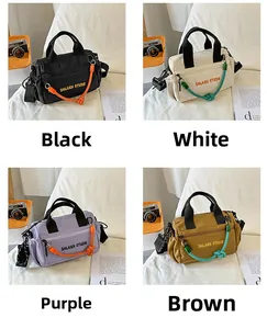 Detailed view of casual crossbody bags in black, beige, purple, and brown color options