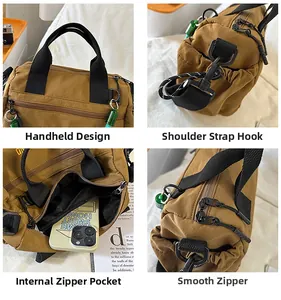 Detail of a brown nylon crossbody bag with dual zippers, reinforced hooks and inner pocket