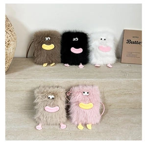 Detailed lineup of colorful plush monster crossbody bags on stone steps in 5 soft shades