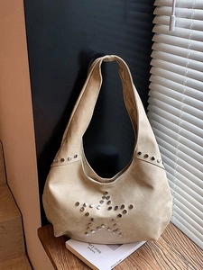 Beige Hobo bag with silver rivet star pattern and integrated wide shoulder strap