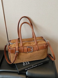 Caramel brown suede Boston bucket bag with leather handles and silver buckle details