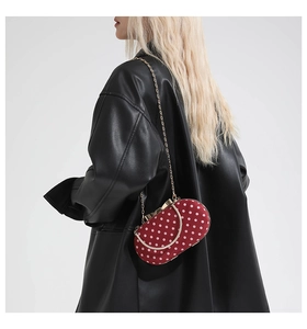 Polka dot mini chain bag with red velvet finish shown as a stylish crossbody crossbody bag