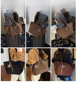 Collage of large capacity suede tote bags in brown and black with star pendant detail