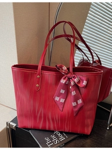 Red wave textured tote bag with traditional silk scarf and golden rivet accents