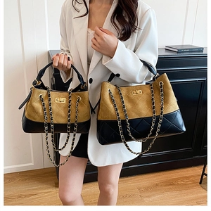 Comparison of large and small quilted chain bucket bags in brown and black with turn-lock