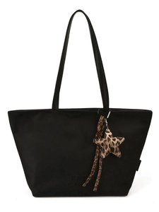Black casual tote bag with leopard star pendant shown on a clean white background