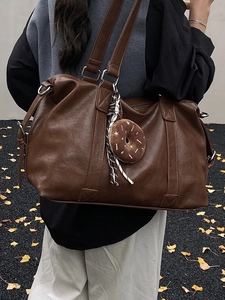 Large capacity dark brown faux leather tote bag with vintage texture and plush charm