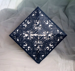 Elegant navy blue laser cut invitation card with intricate European hollow floral pattern