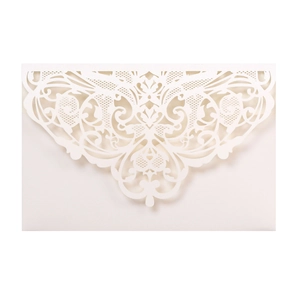 Detail of laser-cut lace wedding invitation in pearl white high-quality textured paper