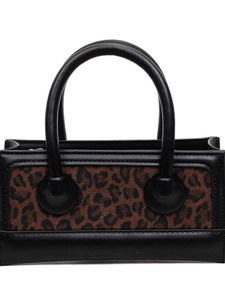 Mini black leather tote bag with brown leopard print panels and dual round handles