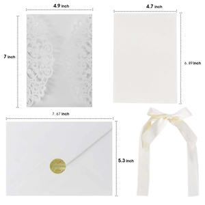 Laser cut invitation set with elegant white hollow cover, ribbon, and seal sticker