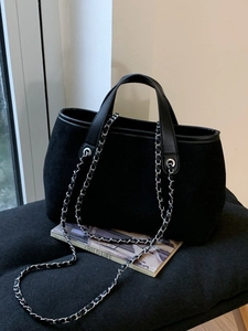 Black suede tote bag with silver chain strap and leather handles for women