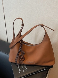 Retro brown hobo crossbody bag with lychee texture and woven charm for women