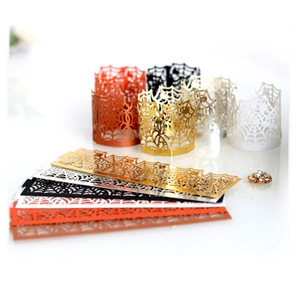 Halloween spider web laser cut candle wraps and cupcake liners in five metallic colors