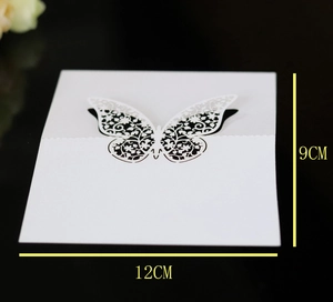 White laser-cut butterfly place card for weddings, 12cm by 9cm hollow design for tables