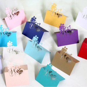 Laser cut hollow Mr & Mrs wedding place cards in various colors for table seating
