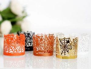Halloween spider web laser cut candle shades in multiple colors for festive party decor