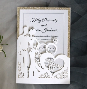Detailed laser-cut wedding invitation featuring heart and diamond ring lace design