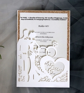 Detailed laser-cut wedding card with couple silhouette, ring and Mr & Mrs heart design